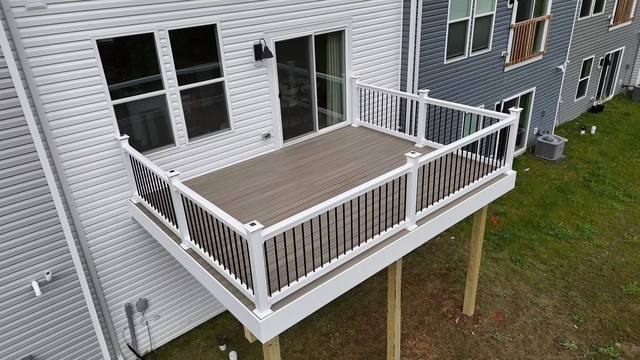 Trex deck with solar cap lights on post tops, Harmony Jackson Township PA